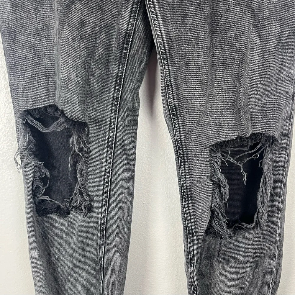 FREE PEOPLE Maggie Black Wash Button Fly Busted Knees Sharkbite Hem Jeans 26